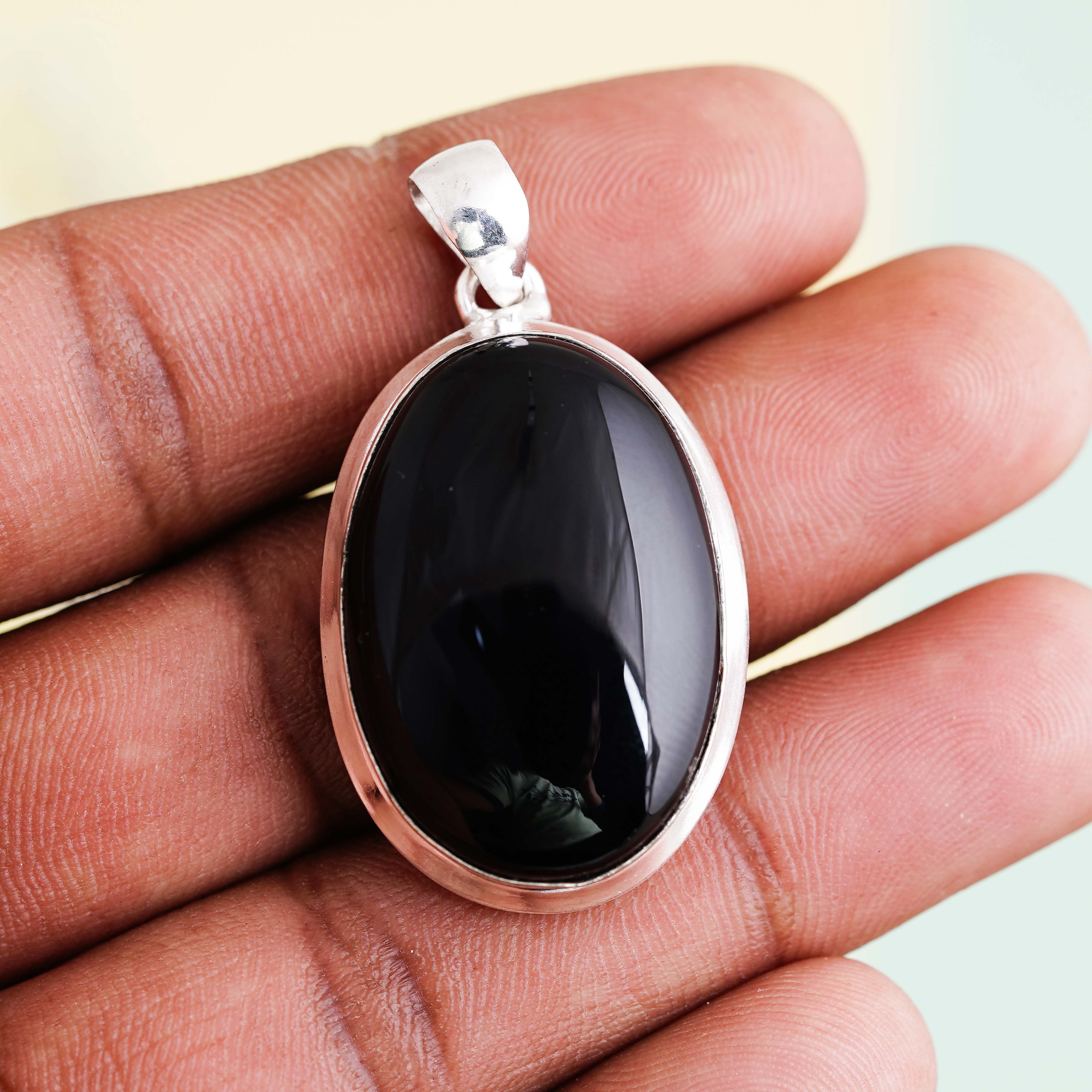 Elegant Black Onyx Pendant | Sterling Silver Frame