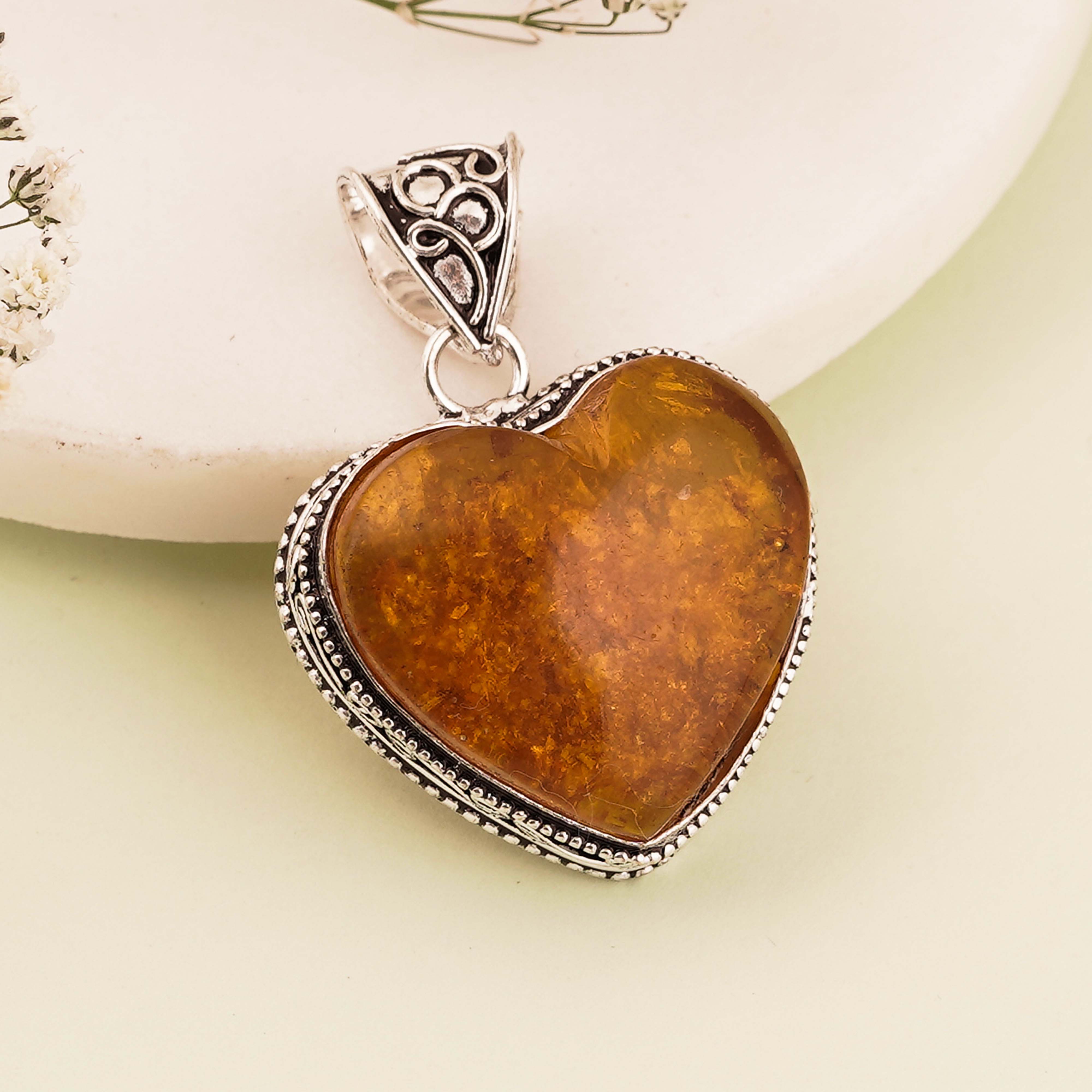 Vintage Heart-Shaped Amber Pendant in Sterling Silver