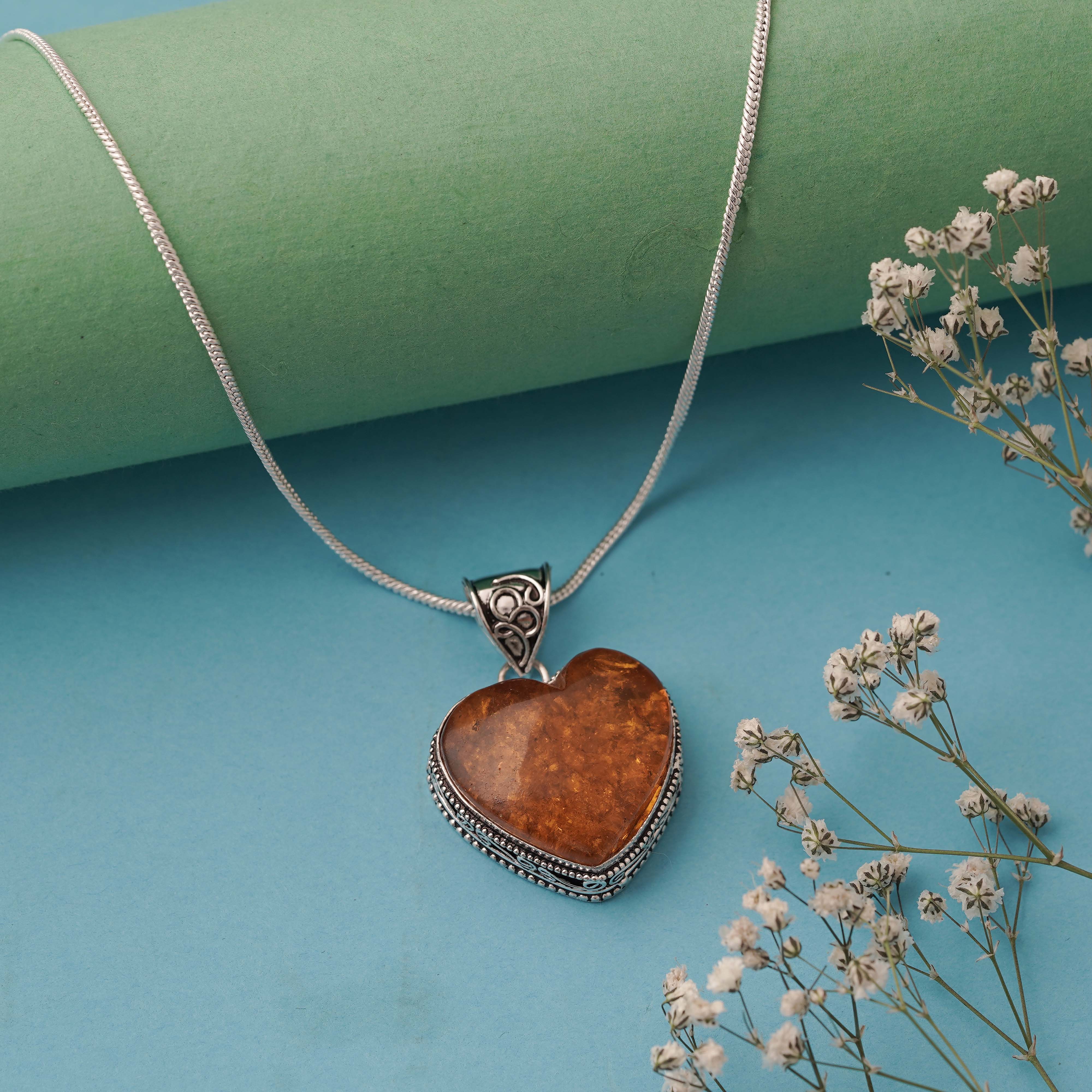 Vintage Heart-Shaped Amber Pendant in Sterling Silver