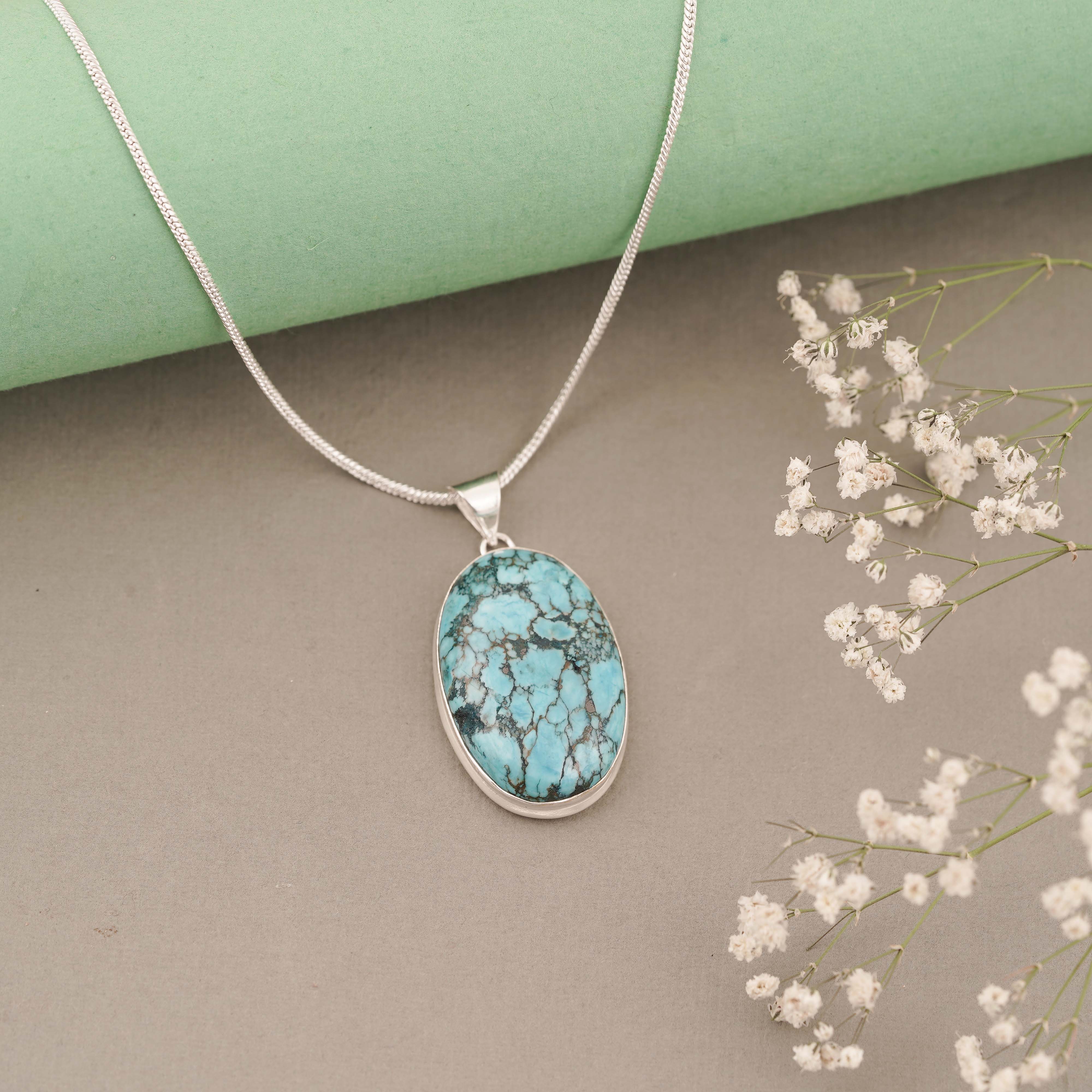 Oval Blue Turquoise Pendant in Sterling Silver