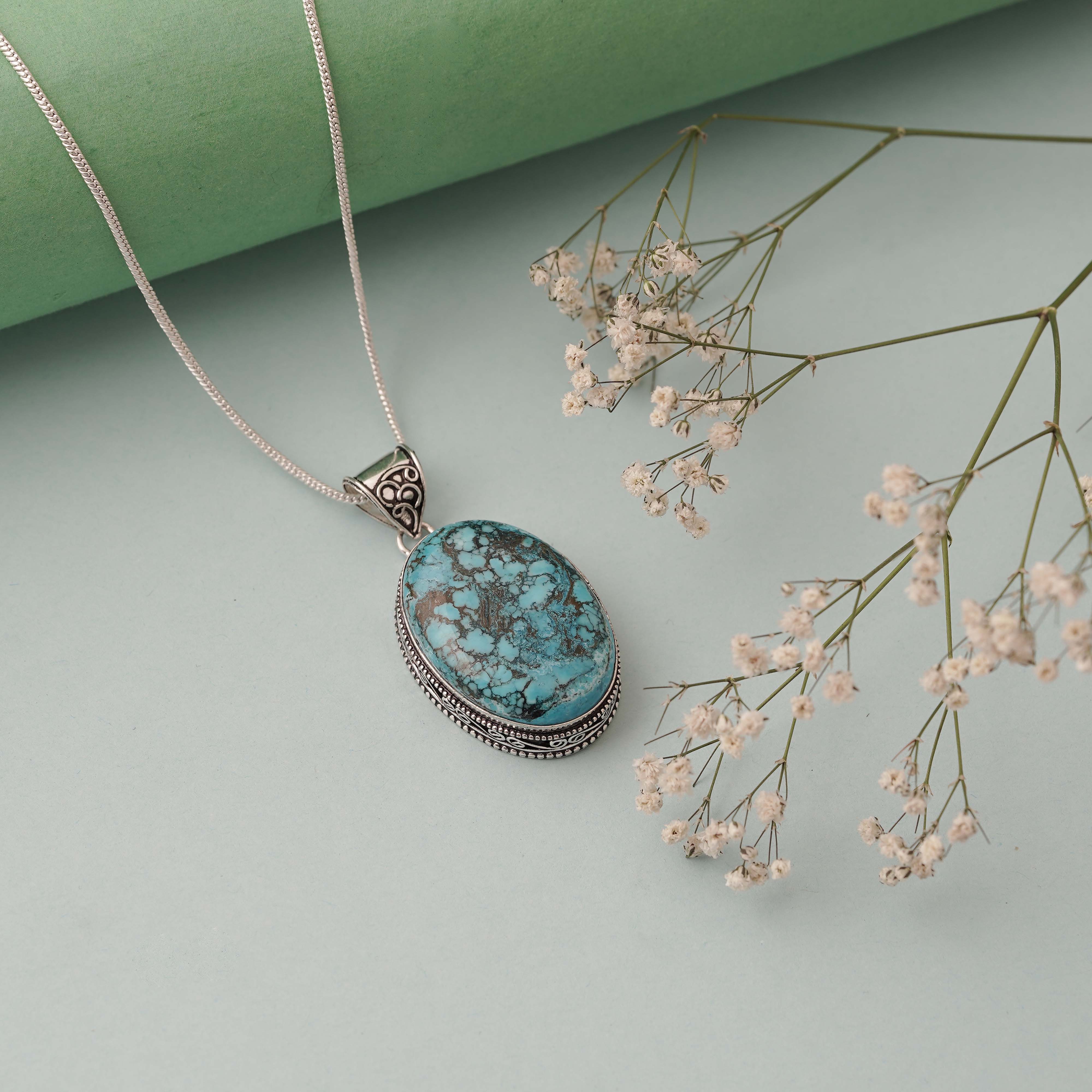 Oval Blue Turquoise Pendant in Sterling Silver